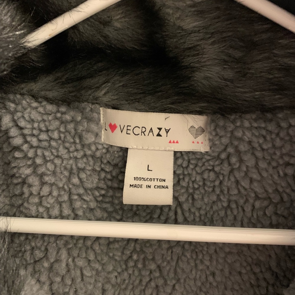 Warm gray sweater with faux fur neck.